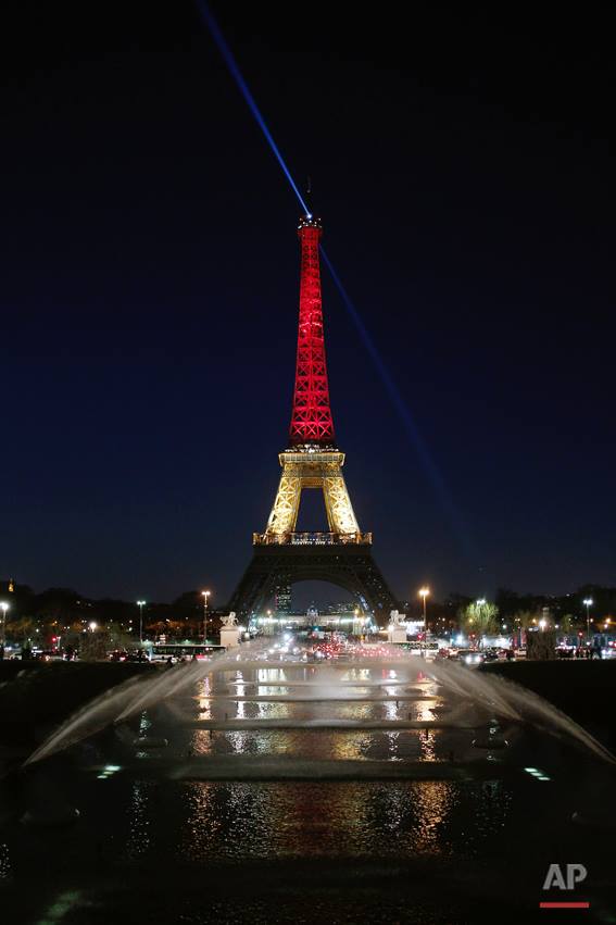 The Eiffel Tower is illuminated with the #Belgium national colors black, yellow and red in honor of the victims of the today's attacks at the airport and the metro station in Brussels, in Paris, Tuesday, March 22, 2016.